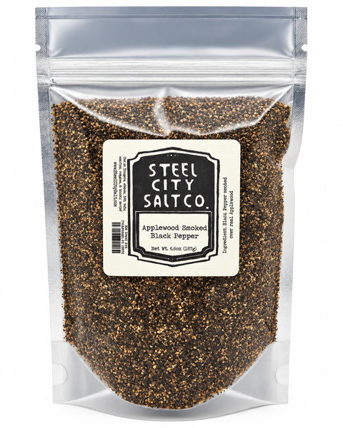 Steel City Salt Co. Applewood Smoked Black Pepper in a clear resealable stand-up pouch with a cream label, shown on a white background.
