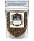 Steel City Salt Co. Applewood Smoked Black Pepper in a clear resealable stand-up pouch with a cream label, shown on a white background.